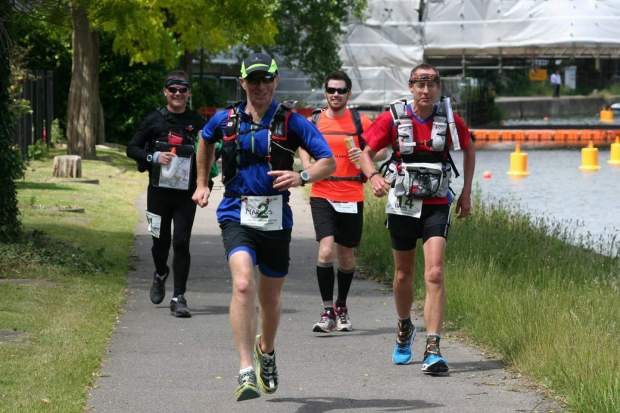 Someone taking a picture!  We'd better run then!!!  Marcus in blue, Darren in orange, and Mark (with Sleepy on the far left).  I'm the good-looknig one on the right.